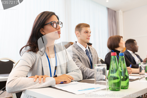 Image of happy business team at international conference