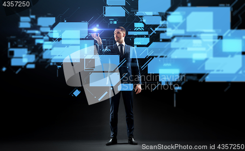Image of businessman working with virtual screen