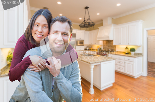 Image of Mixed Race Caucasian and Chinese Couple Inside Beautiful Custom 