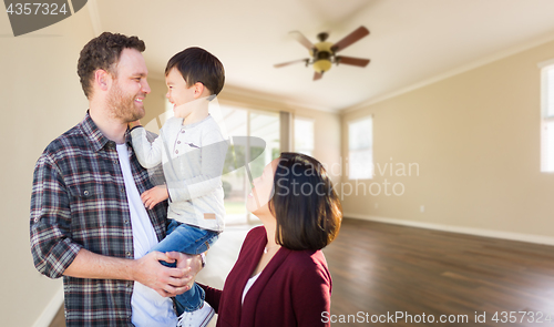 Image of Young Mixed Race Caucasian and Chinese Family Inside Empty Room 