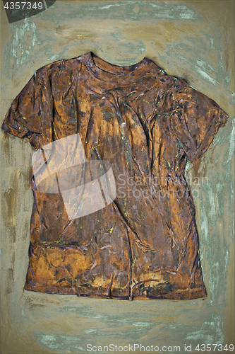 Image of a rusty shirt on canvas art