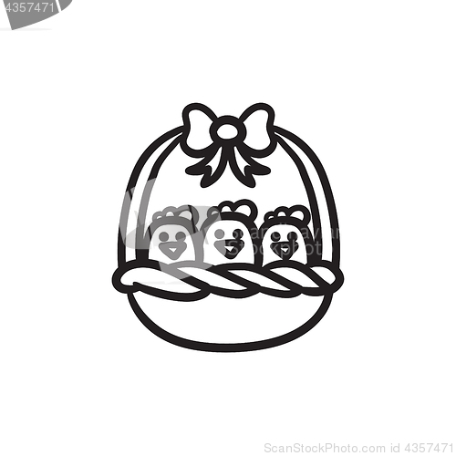 Image of Basket full of easter chicks sketch icon.