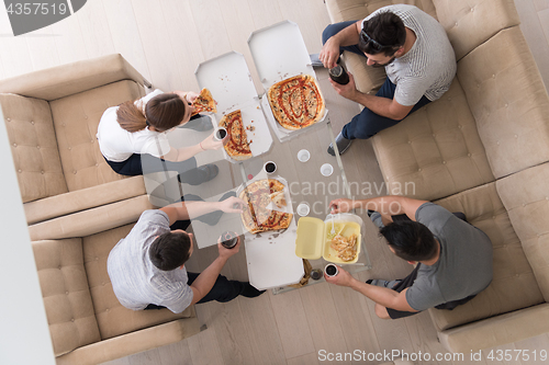 Image of Pizza time a group of people