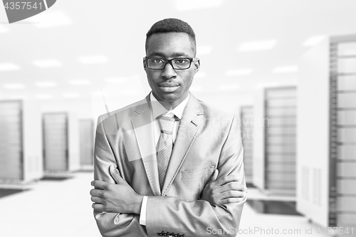 Image of Young black man in server room