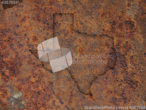 Image of Map of Texas on rusty metal