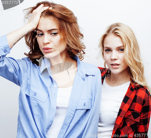 Image of best friends teenage girls together having fun, posing emotional on white background, besties happy smiling, lifestyle people concept close up