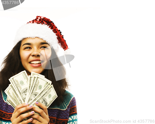 Image of cute young girl in santas red hat with money isolated