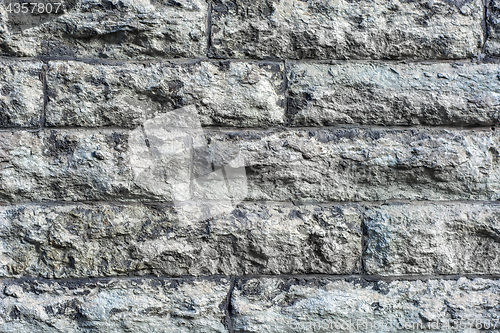Image of A wall of grey stone.