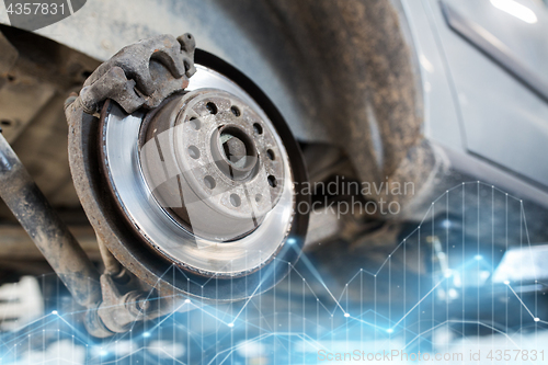 Image of car brake disc at repair station
