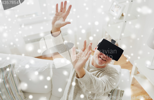 Image of old man in virtual reality headset or 3d glasses