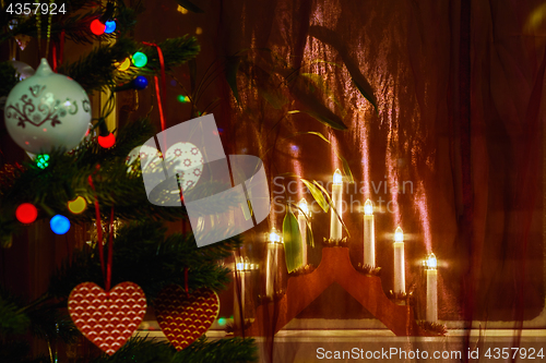 Image of Menorah and Christmas tree.