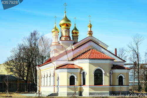 Image of Church with gilded domes.