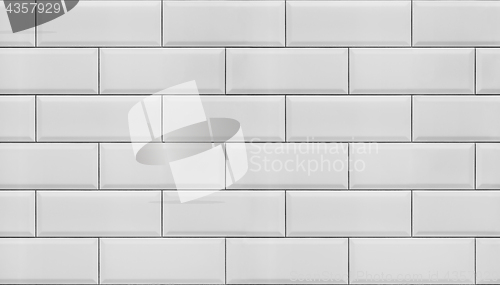 Image of Wall of white tiles.