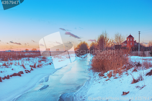 Image of Winter Rural Landscape At Sunset