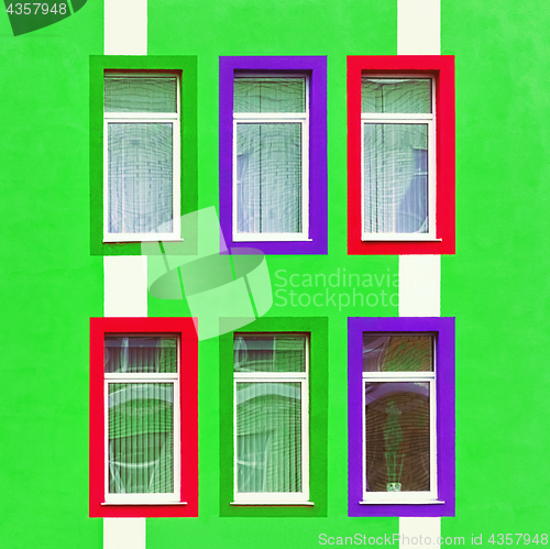 Image of Green Wall With Colorful Windows