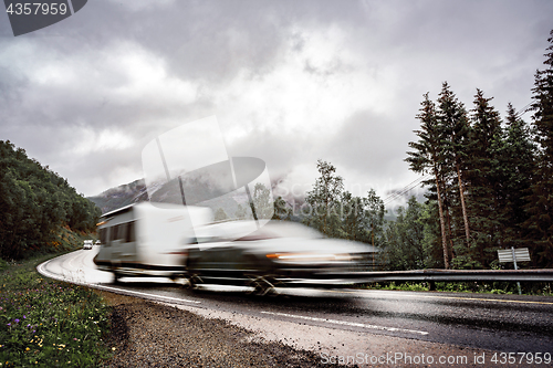 Image of VR Caravan car travels on the highway.