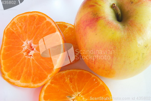 Image of apple and slices of orange