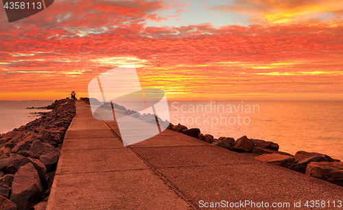 Image of Sensational red sunrise skies at the Breakwall