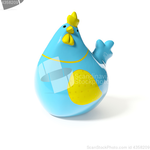 Image of a stylish blue and yellow ceramic chicken for easter decoration