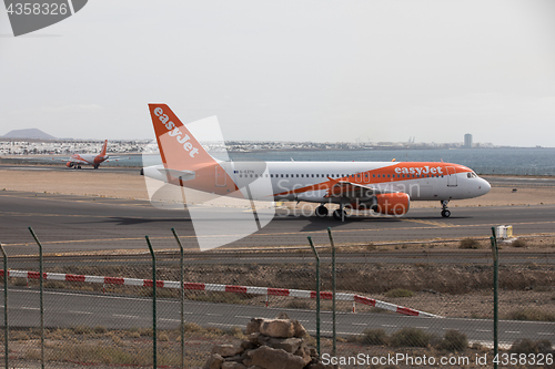 Image of ARECIFE, SPAIN - APRIL, 15 2017: AirBus A320 - 200 of easyjet re