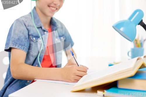 Image of close up of student boy doing homework