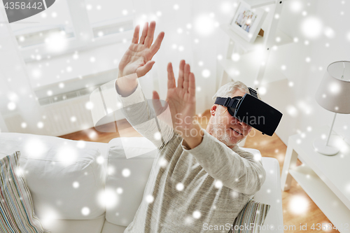 Image of old man in virtual reality headset or 3d glasses