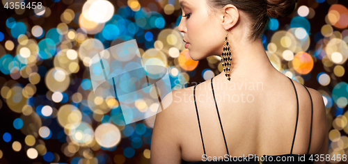 Image of close up of beautiful woman face with earring