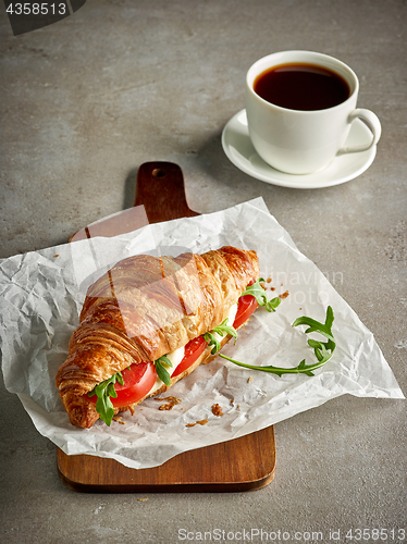 Image of Croissant with tomato and mozzarella