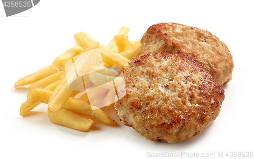 Image of fried potatoes and chicken cutlets