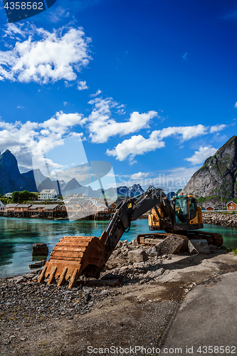 Image of Excavator, bulldozer repair work on the road. Norway