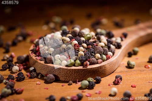 Image of Mixed peppercorns. Dry mix peppercorns close up