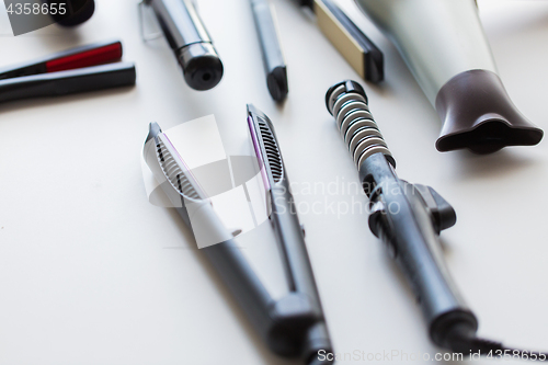 Image of hairdryer, hot styling and curling irons