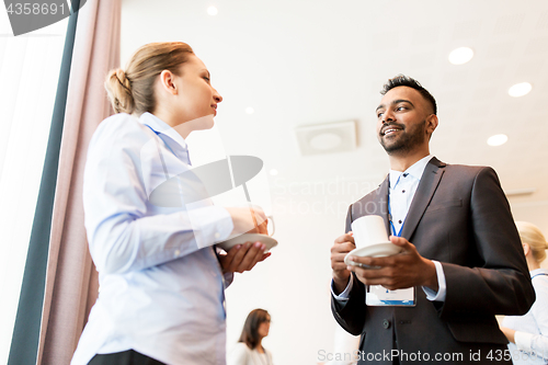 Image of happy business team at international conference