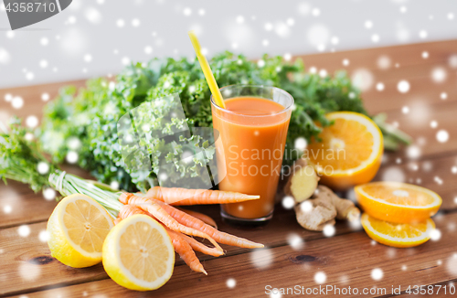 Image of glass of carrot juice, fruits and vegetables