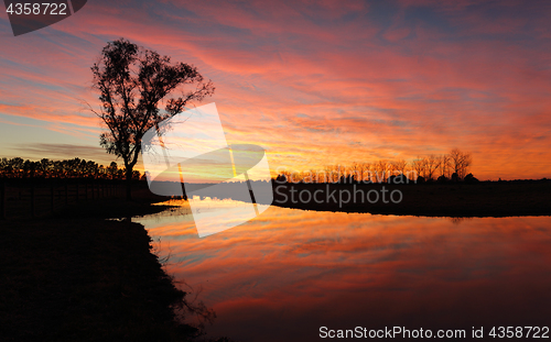 Image of Vivid rural sunrise with fiery skies