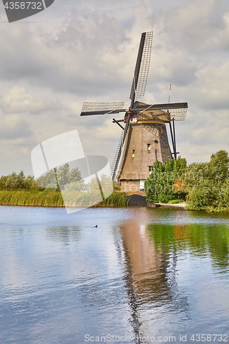 Image of Windmill beside a canal