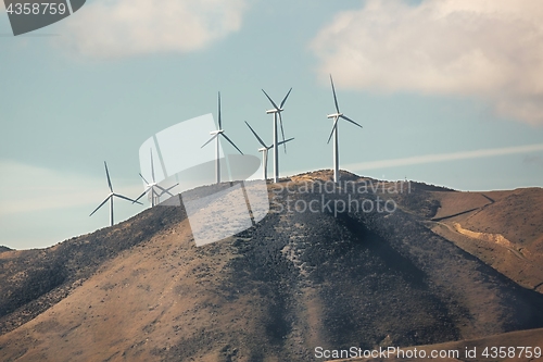 Image of Wind tubines on a hill