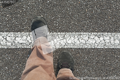 Image of Stepping over the line