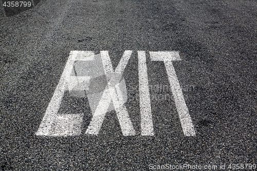 Image of Exit sign on asphalt