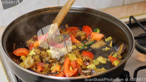 Image of Preparing hot breakfast