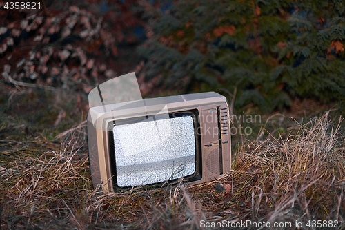 Image of TV no signal in grass