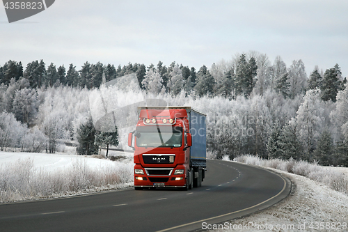 Image of MAN Semi Trailer and Winter Road Landscape