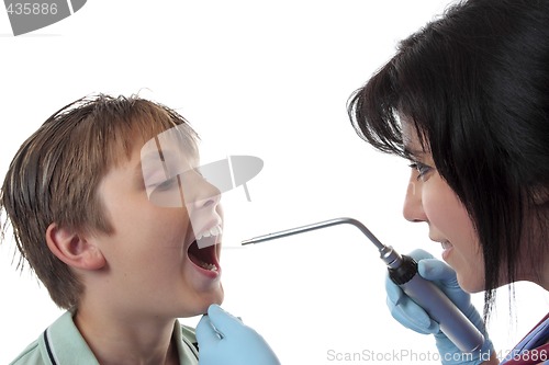 Image of Doctor examining child.