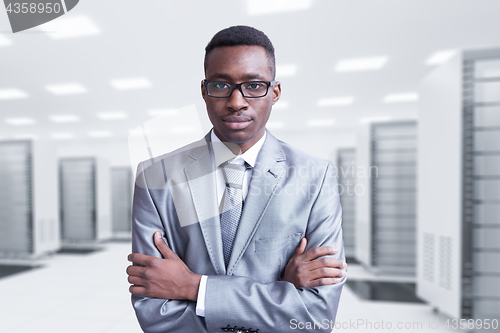 Image of Young black man in server room