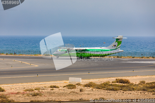 Image of ARECIFE, SPAIN - APRIL, 16 2017: ATR 72 of Binter with the regis