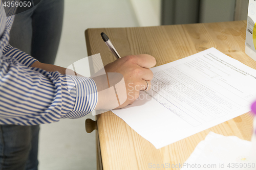 Image of Signing Document