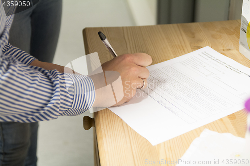 Image of Signing Document