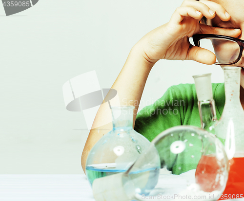 Image of little cute boy with medicine glass isolated