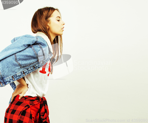 Image of young pretty teenage hipster girl posing emotional happy smiling on white background, lifestyle people concept 
