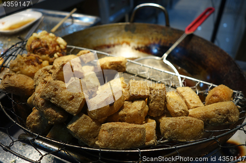 Image of Stinky fried tofu at a Shanghai street